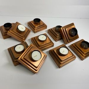 10 copper Tea light candle stands.